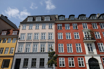 Fototapeta na wymiar The characteristic pastel colors of the buildings in the city of Copenhagen