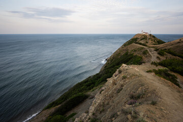 Sunset view of the lighthouse at Cape Emine, Black sea coast, Bulgaria.