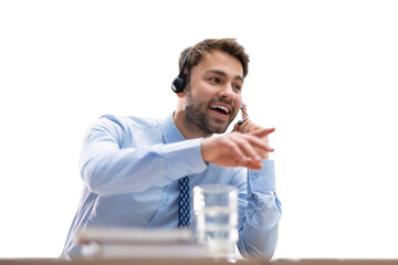 Cheerful young support phone male operator in headset, at workplace while using computer, help service and client consulting call center concept on a transparent background.