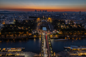 Fototapeta na wymiar sunset view from Eifel tower towards the west, over Trocadero and towards La Defense in the summer evening 