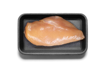 Raw chicken breast on a styrofoam tray from above with a semitransparent shadow