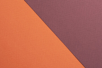 Rough kraft paper background, paper texture red burgundy orange colors. Mockup with copy space for text.