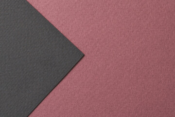 Fototapeta premium Rough kraft paper background, paper texture red burgundy black colors. Mockup with copy space for text.