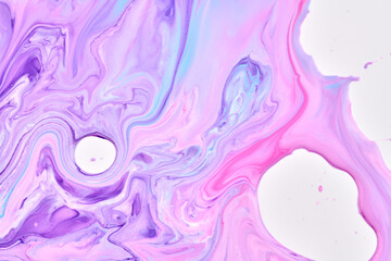 Paint drops and splashes on white paper. Multicolored explosion, purple lilac ink blots abstract background, fluid art