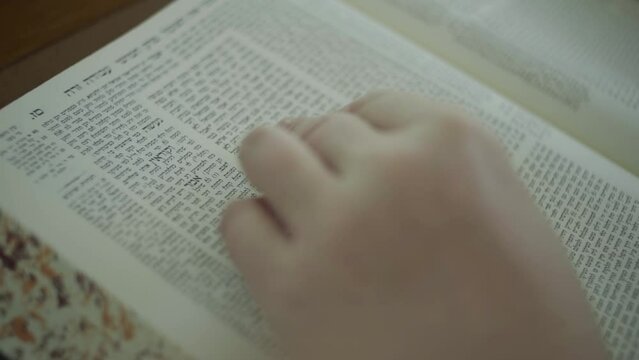 Jewish man read from the Jewish Bible Torah