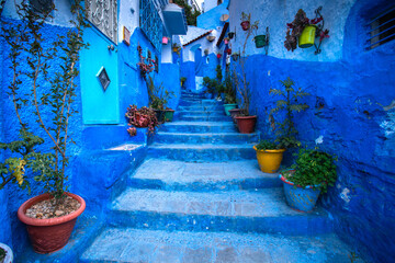 Blue shade of houses, street and alley in Chefchaouen, a city in northwest Morocco where is noted...
