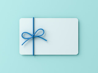 Blank white gift card with blue ribbon rope bow isolated on blue cyan pastel color background with shadow minimal concept 3D rendering