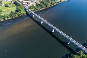 Aerial drone view of the international bridge over the Minho river between the Spanish town of Tui and the Portuguese town of Valença do Minho.