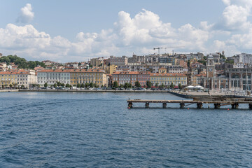 Fototapeta na wymiar cityscape with waterfront at Pescheria pier, Trieste, Friuli, Italy