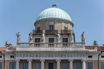 statues and dome on Carciotti building, Trieste, Friuli, Italy