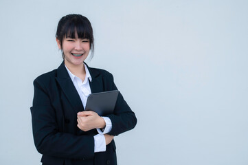 Portrait of a successful business woman,Beautiful Woman Going To Work Walking Near Office Building,professional entrepreneur standing in office clothing