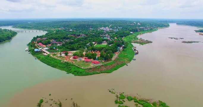 Aerial view amazing two colors in two rivers at three junctions in Khong Chiam Ubon Ratchathani Thailand..Mekong river the border between Thai and Lao..islands in the middle of Kong river background.