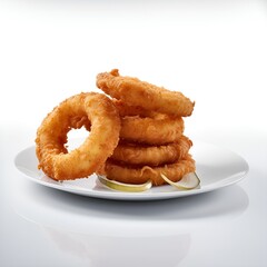 Fried summertime onion rings on a plate isolated on a white background