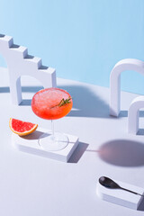 Blood red orange Margarita, most iconic classic cocktails . Tasty citrus brilliant bright orange red drink that's perfectly balanced and sweet tart, Retro chic style, vintage architectural props - 625657270