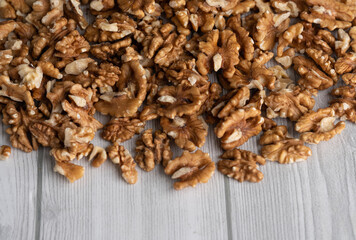 Walnuts on a wooden background