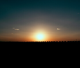 silhouette of a train in the hot sun