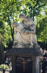 Grave sculpture of the mourning Mother of God holding the body of Jesus Christ on her lap at the...