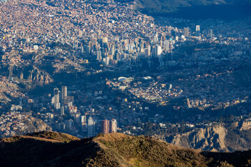 View from the landmark Muela del Diablo over the highest administrative capital, the vibrant city La Paz in Bolivia - traveling and exploring South America