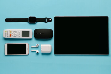 Modern gadgets on blue background