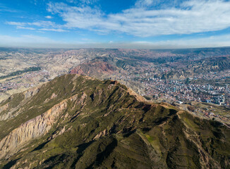 Aerial view from the impressive landmark Muela del Diablo down into the valley with the highest capital and vibrant city La Paz and El Alto, Bolivia