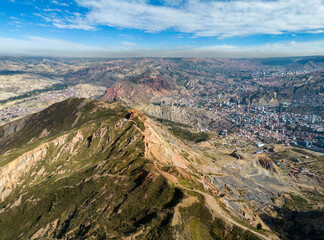 Aerial view from the impressive landmark Muela del Diablo down into the valley with the highest capital and vibrant city La Paz and El Alto, Bolivia