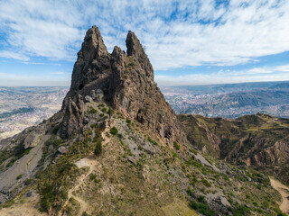 Scenic rock formation and viewpoint Muela del Diablo, the Devil´s tooth, overlooking the highest capital and vibrant city La Paz and El Alto, Bolivia