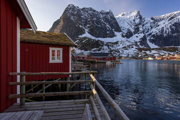 scenery of Reine lofoten with red hut in winter