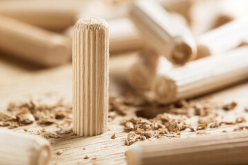 hole in wooden oak board for wooden dowel. carpentry industry.