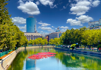 Landscape view of the famous Dambovita River crossing the city of Bucharest on a sunny day in Romania