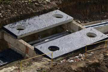 Laying new water pipes at a construction site. Utility and utility renewal work