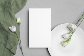 Wedding paper blank menu card mockup with eustoma flowers, mockup with copy space