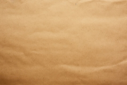 Close-up of Light Brown Kraft Paper Texture with Vignette Effect