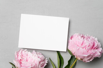 Invitation or greeting card mockup with peony flowers, blank card mock up with copy space