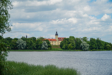 Obraz premium church on the river bank