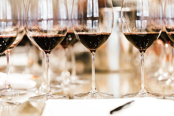 Close up wine glasses of red wine without hands 