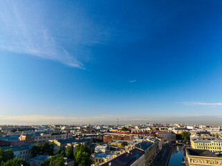 Aerial, down view of the Nevski street and Cathedral of the Resurrection of Christ next to House of the Singer company in the historical city of St.Petersburg at sunny summer morning
