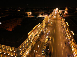 Fototapeta na wymiar Aerial view of the bright Nevski street and Kazan Cathedral and House of the Singer company in the historical city of St. Petersburg at light night 