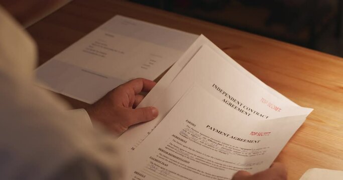 Top Secret stamped on Classified papers, close-up shot