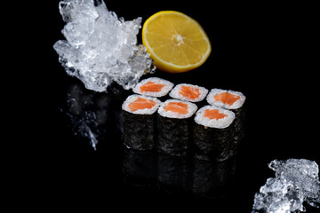 salmon maki on black background for online restaurant menu 2 © Михаил Шорохов