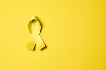 World Suicide Prevention Day concept with awareness yellow ribbon
