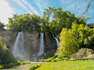 Fototapeta premium Sunny view of the landscape of the Rifle Falls