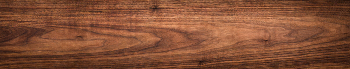 Wood texture background. Walnut wood texture. Extra long plank texture background.