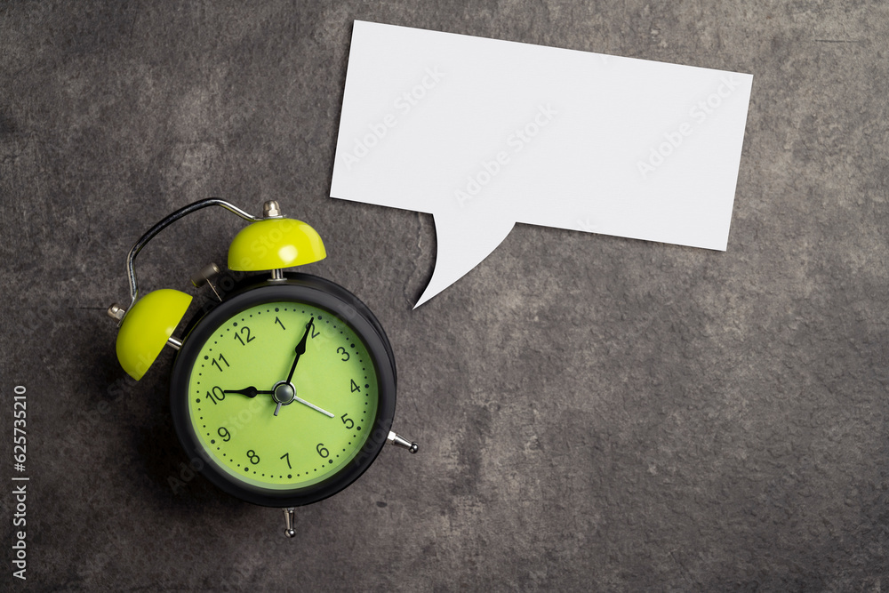 Poster empty paper with speech symbol and clock