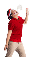 Fototapeta premium Indonesian men celebrate Indonesian independence day on 17 August with crackers eating competition