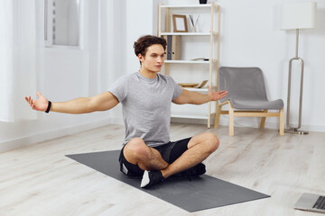 Fototapeta premium activity man gray dumbbells home training lifestyle body indoor sport health