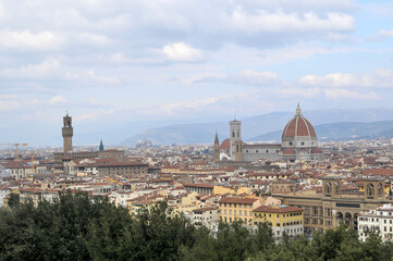 Fototapeta na wymiar Vew of Palazzo Vecchio And Cathedral of Saint Mary of the Flower In Florence, Italy