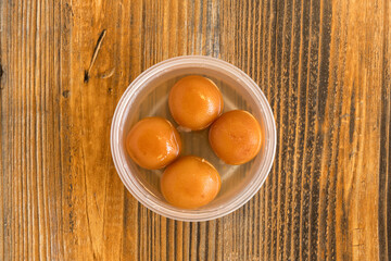 Indian fried dough balls soaked in syrup