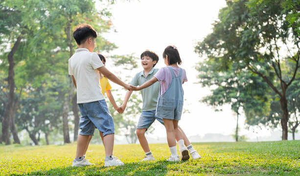 group image of asian children having fun in the park