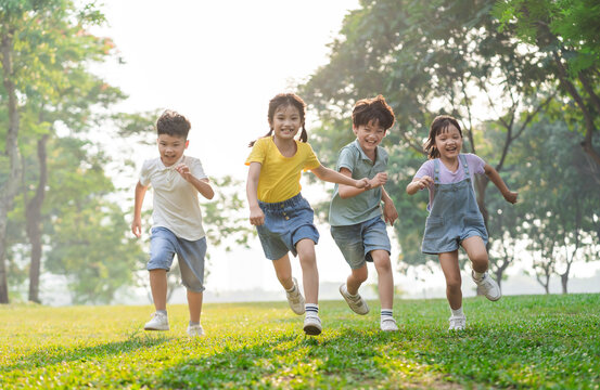 group image of asian children having fun in the park