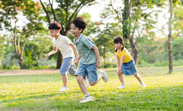 group image of asian children having fun in the park